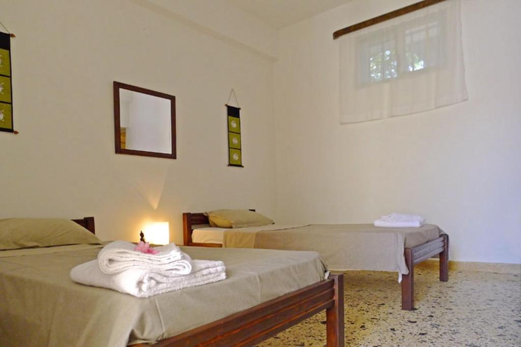 Aumkara Apartment Skala Eresou Bilik gambar